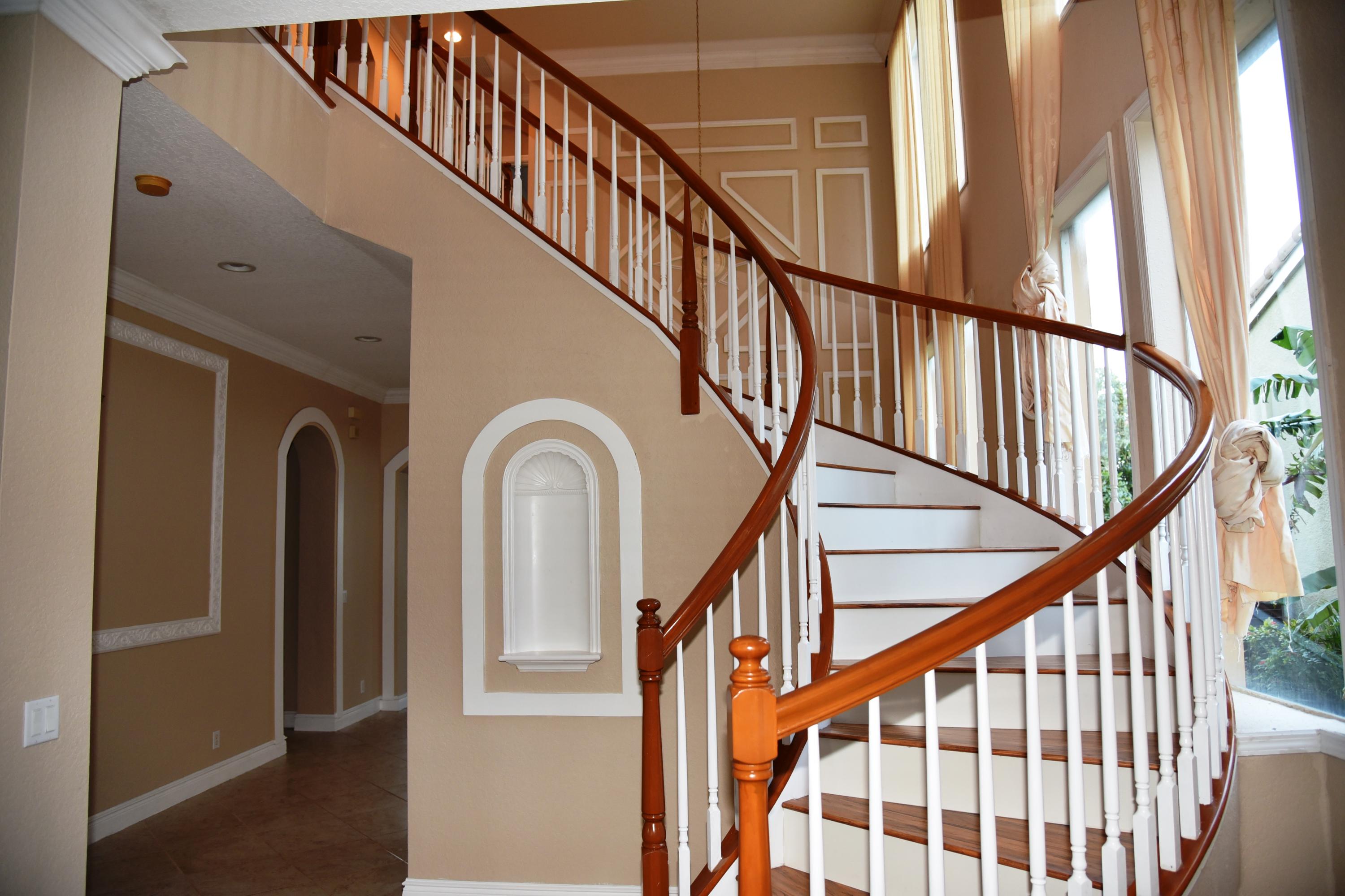 443 Cresta Circle West Palm Beach, FL 33413 - Photo 2 of 22 Spiral Stairway
