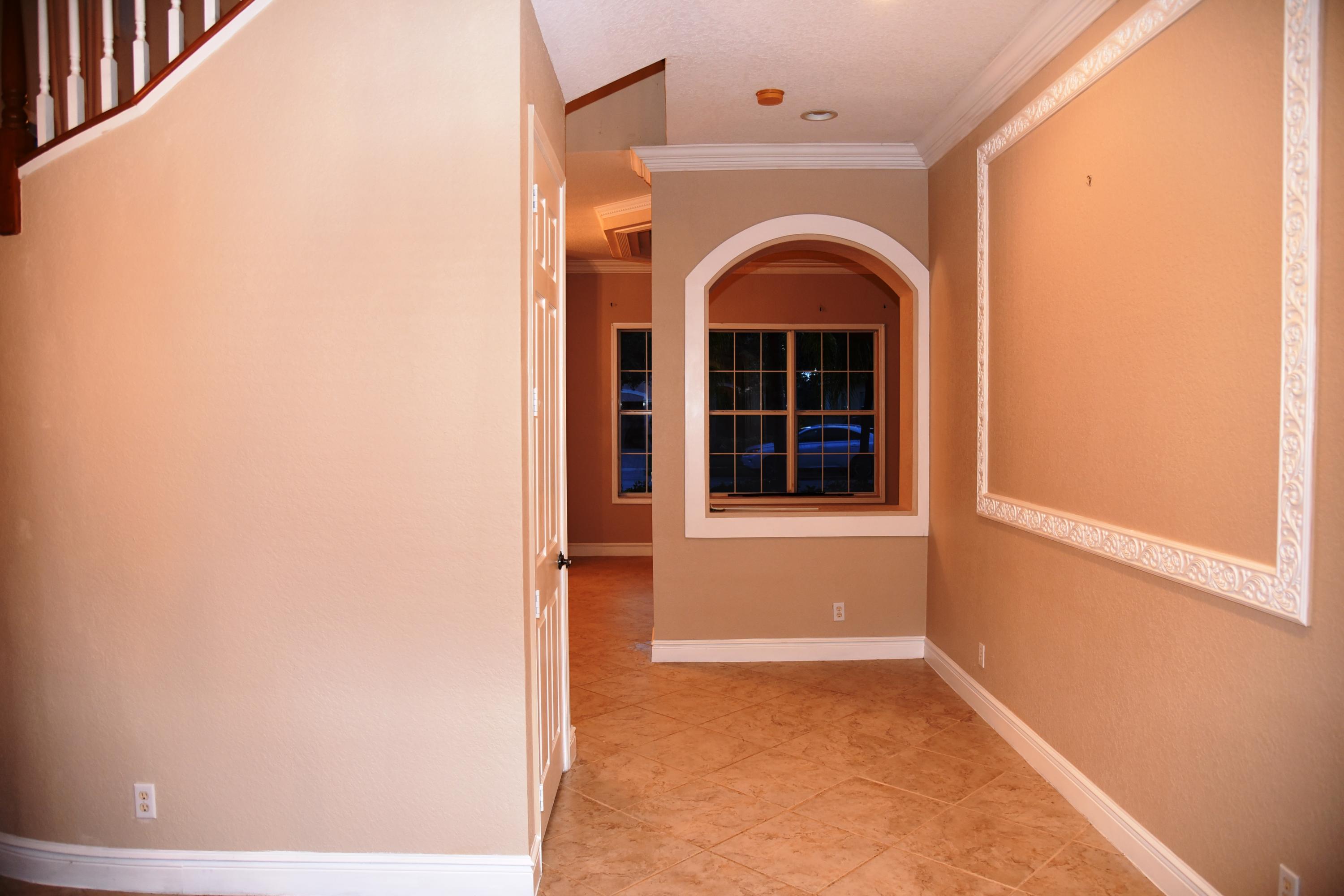 443 Cresta Circle West Palm Beach, FL 33413 - Photo 6 of 22 Formal Dining Hallway