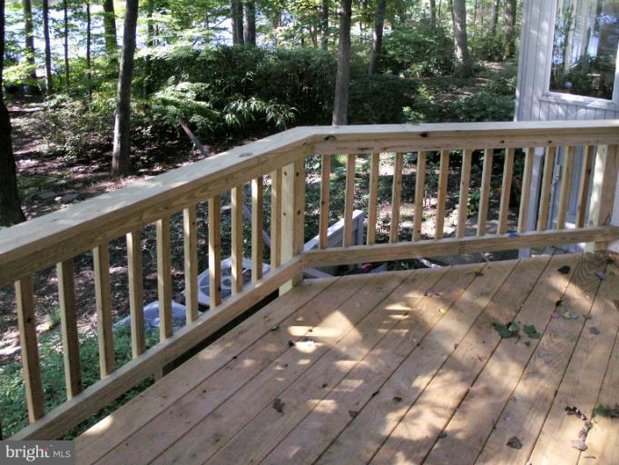 1646 Waters Edge Lane Reston, VA 20190 - Photo 25 of 30 a view of a balcony with wooden floor