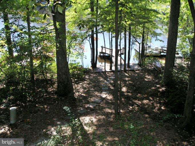 1646 Waters Edge Lane Reston, VA 20190 - Photo 6 of 30 a view of a house with lots of tree