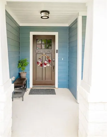 a kitchen with stainless steel appliances a sink and a stove