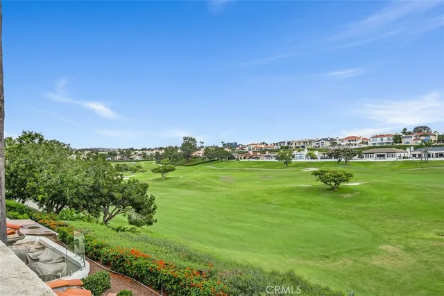 a view of a living room and kitchen