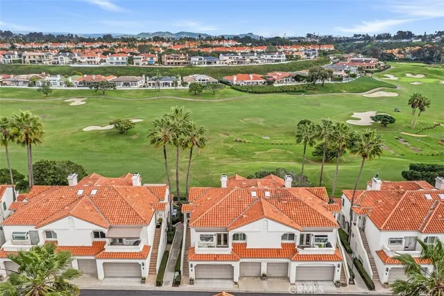 an aerial view of a house with a garden