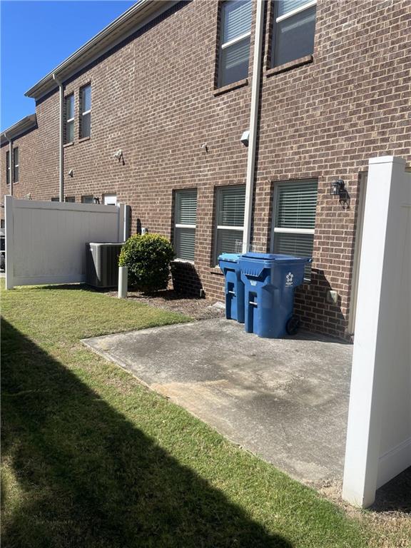 1418 Haynescrest Court, Unit 90 Grayson, GA 30017 - Photo 14 of 14 a front view of a house with yard