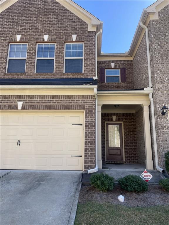 1418 Haynescrest Court, Unit 90 Grayson, GA 30017 - Photo 2 of 14 a front view of a house