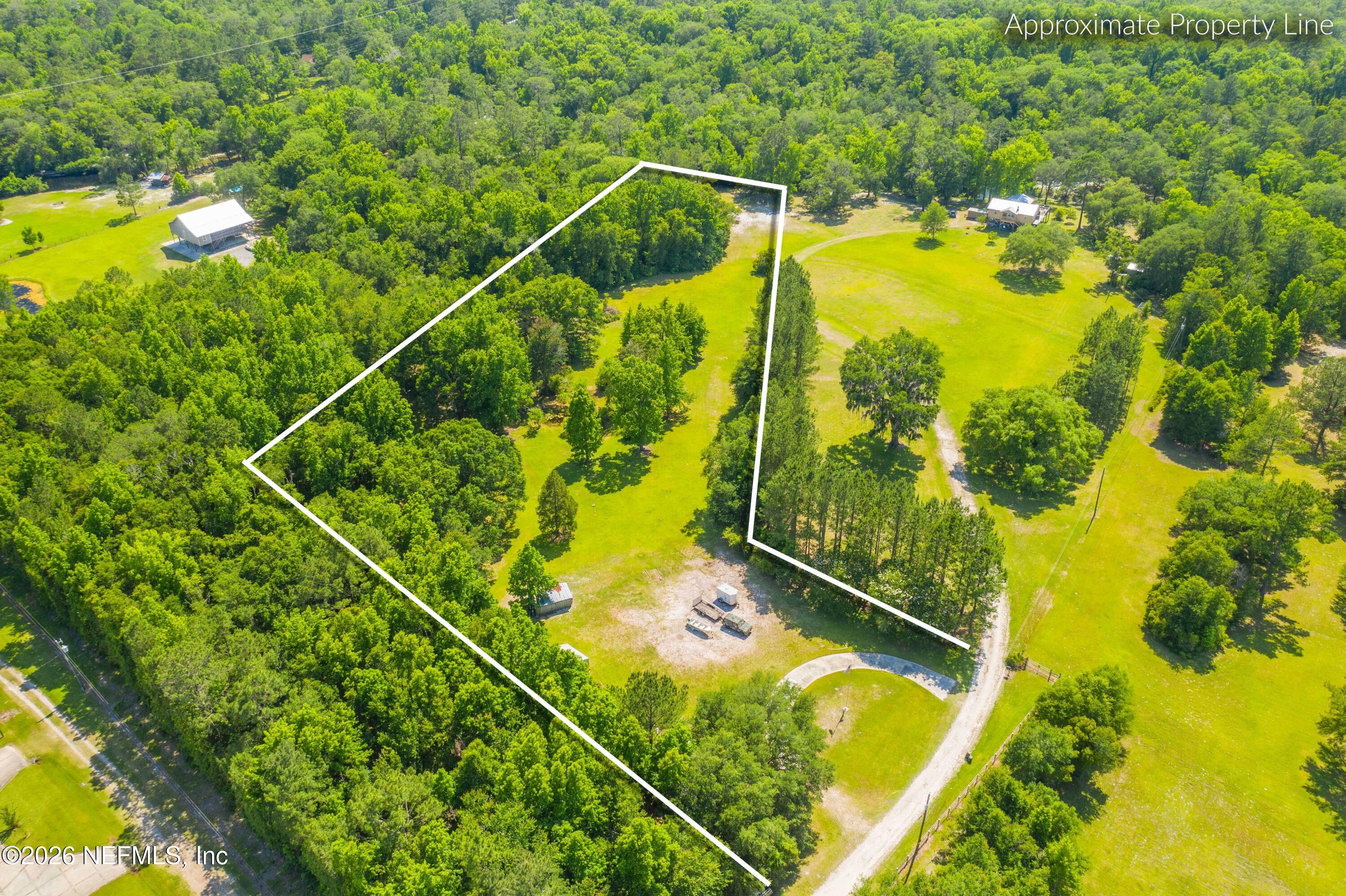 a view of a swimming pool and an outdoor space