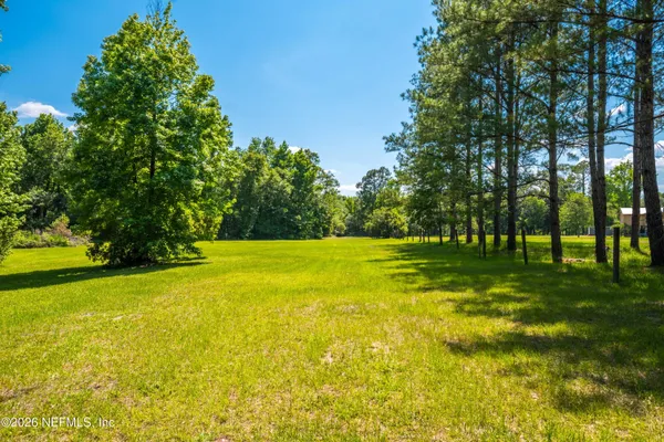 a view of swimming pool with an outdoor space and seating area
