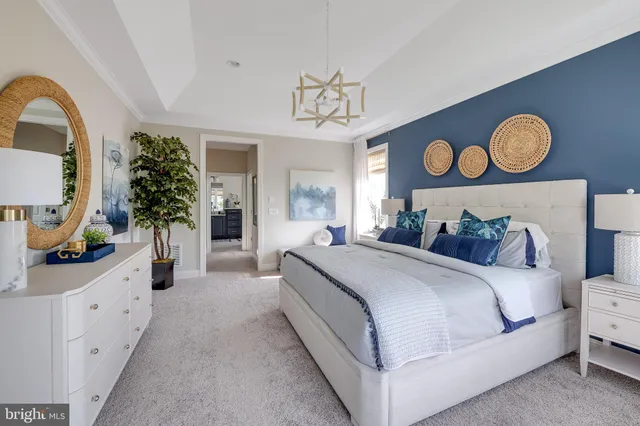 a bedroom with bed and window