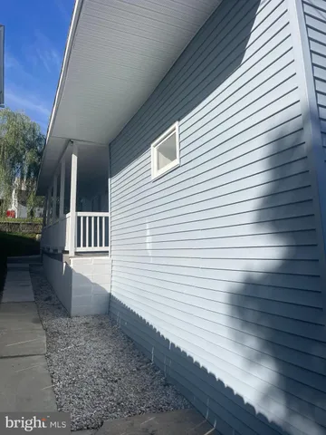 a view of a porch with a chair