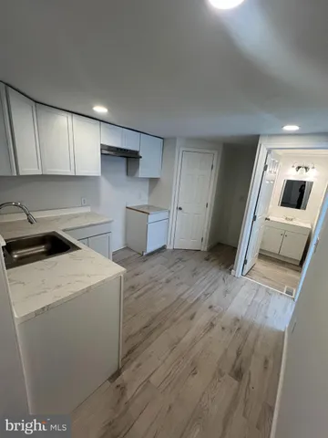 a view of a kitchen with washer and dryer
