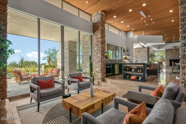 a kitchen with stainless steel appliances granite countertop a sink and a counter
