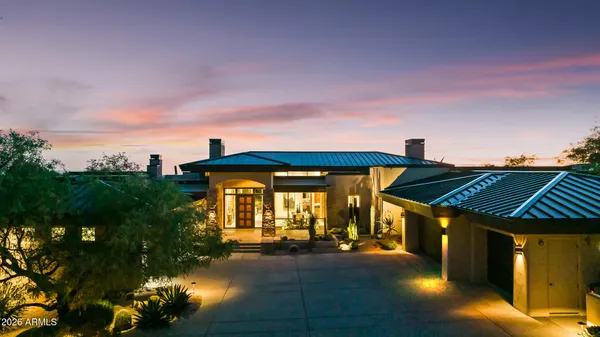 a outdoor space with patio fireplace and couches