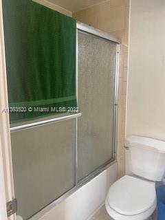 1025 West 77th Street, Unit N Hialeah, FL 33014 - Photo 20 of 30 a white toilet sitting next to a shower