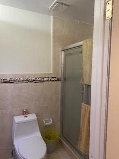 1025 West 77th Street, Unit N Hialeah, FL 33014 - Photo 25 of 30 a bathroom with a toilet and sink