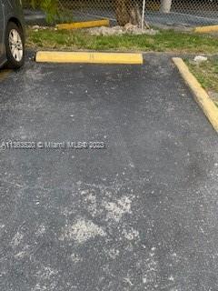 1025 West 77th Street, Unit N Hialeah, FL 33014 - Photo 3 of 30 a view of a yard