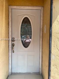 1025 West 77th Street, Unit N Hialeah, FL 33014 - Photo 5 of 30 a close view of door lock