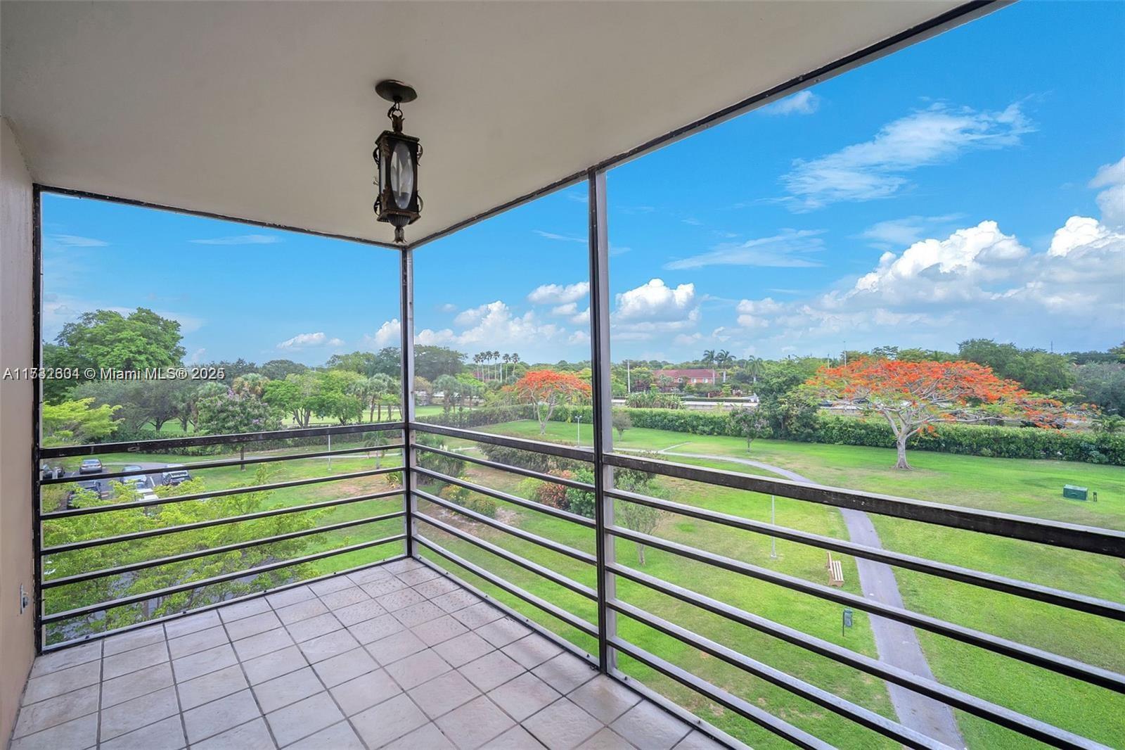 1200 St Charles Place, Unit 419 Pembroke Pines, FL 33026 - Photo 4 of 16 a view of a room with a large window