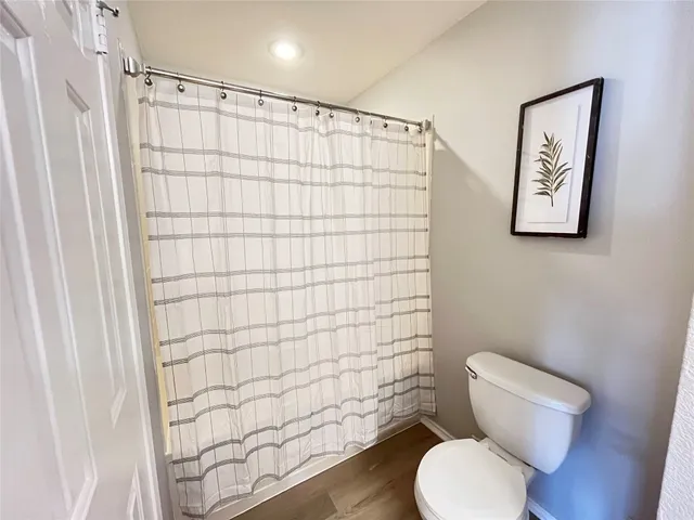 a bathroom with double vanity sink and a mirror