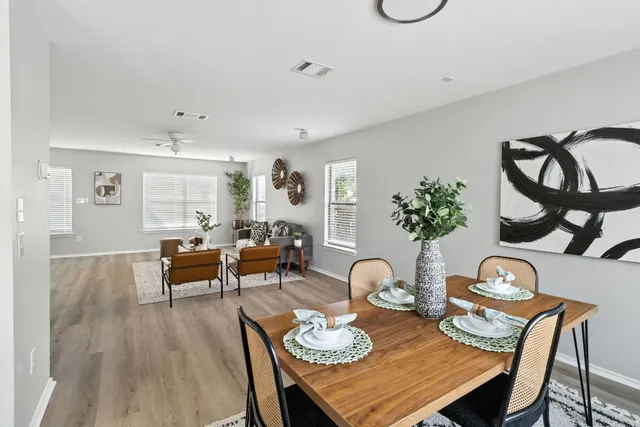 an aerial view of a house with outdoor space and lake view