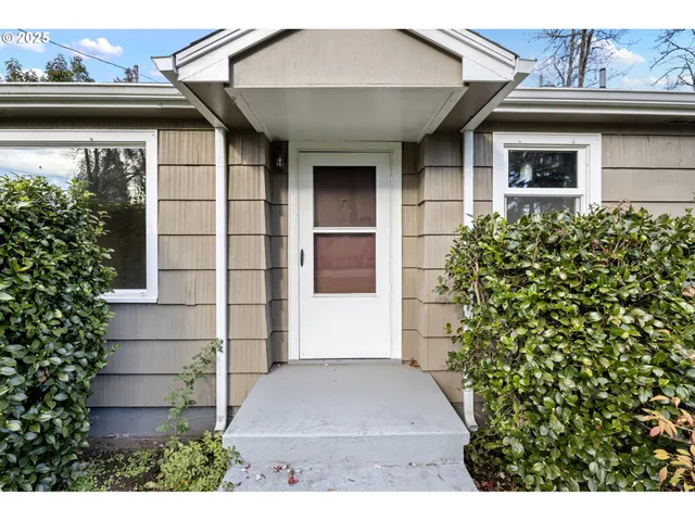 a front view of a house with a garage