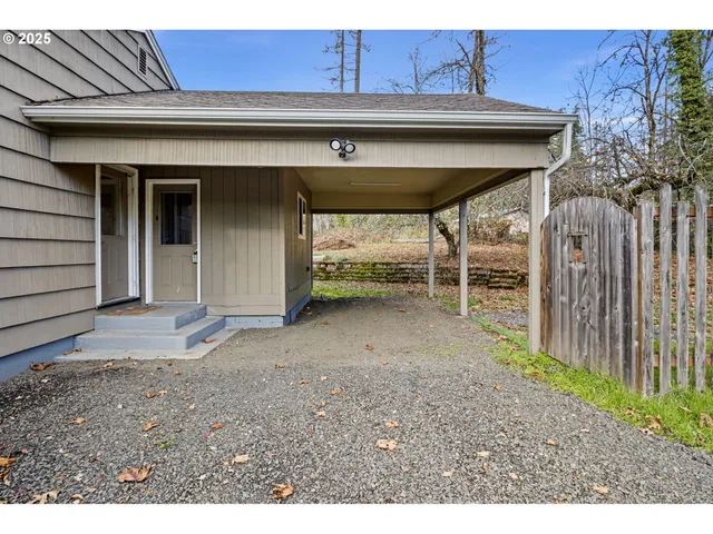 a backyard of a house with lots of green space