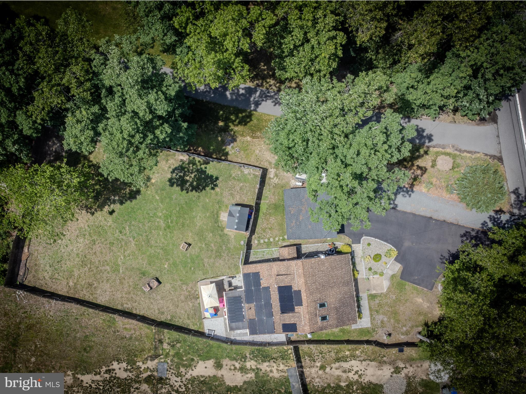 4005 Tuckahoe Road Williamstown, NJ 08094 - Photo 4 of 22 Serene retreat amidst lush greenery.
