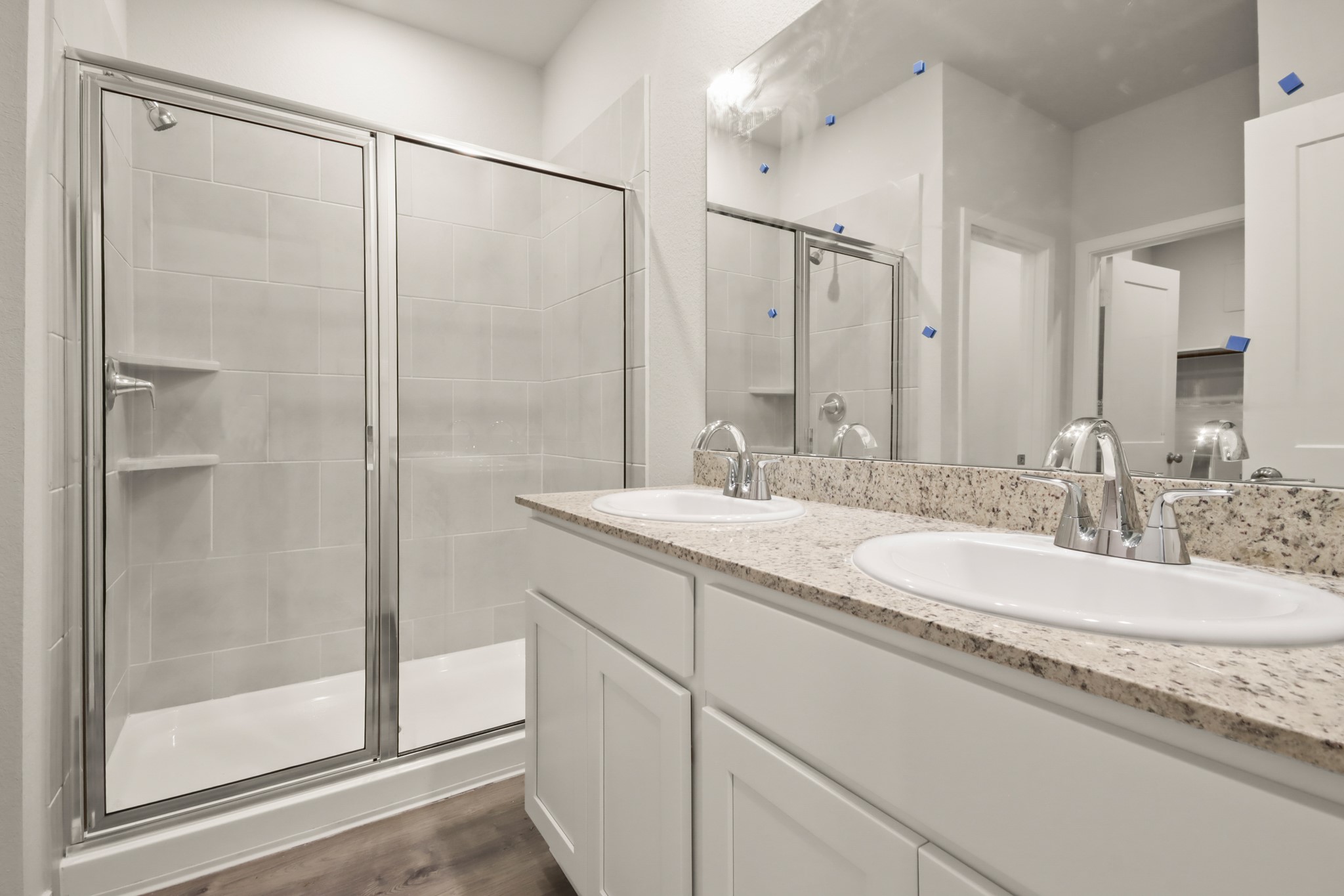 16922 Needlepoint Drive Conroe, TX 77302 - Photo 14 of 31 a bathroom with a granite countertop sink mirror and double