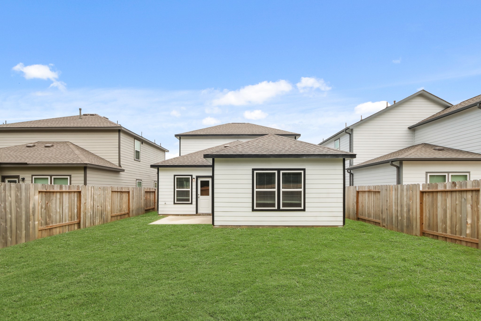 16922 Needlepoint Drive Conroe, TX 77302 - Photo 4 of 31 a house view with a garden space