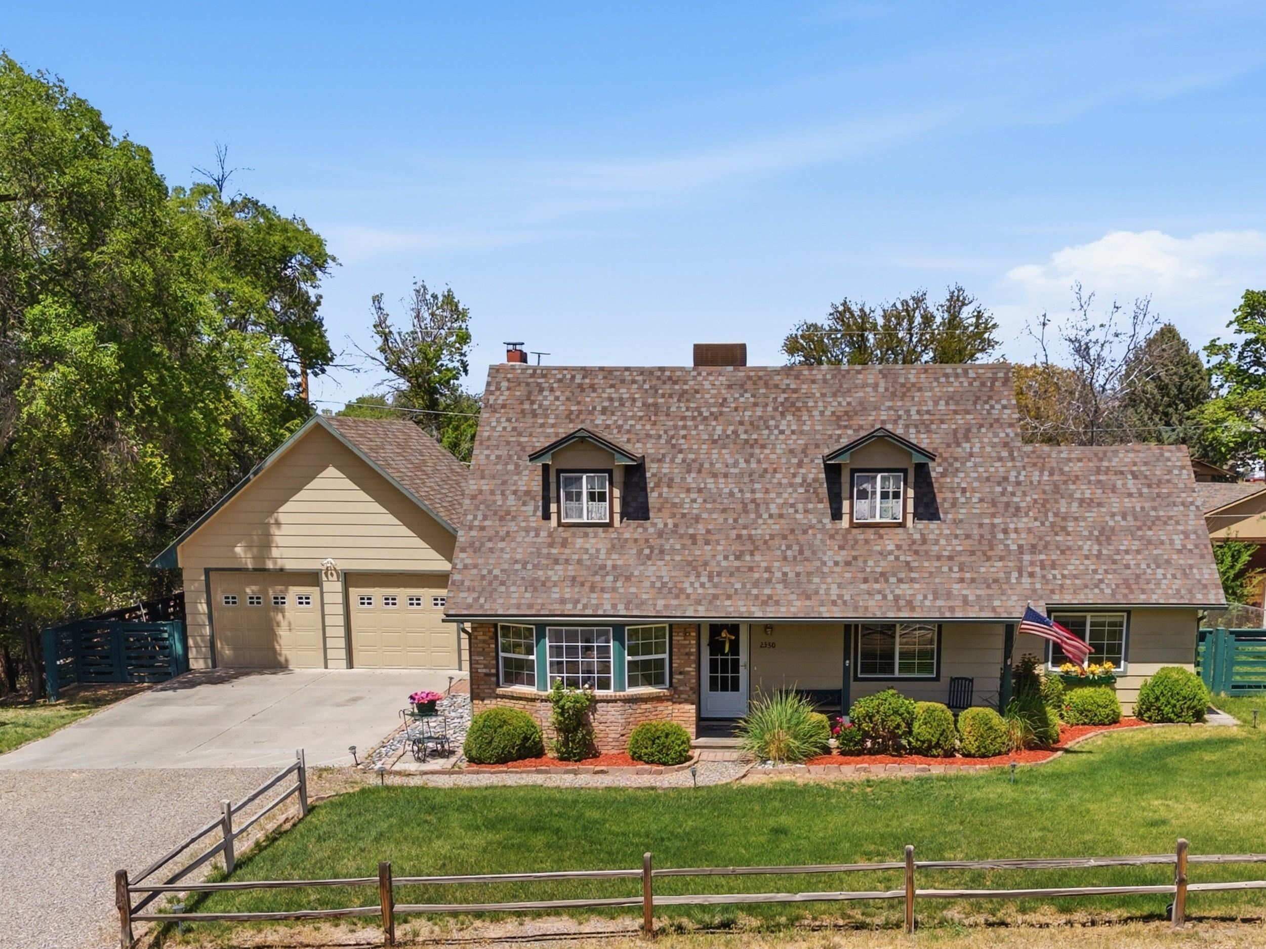 a view of house with yard