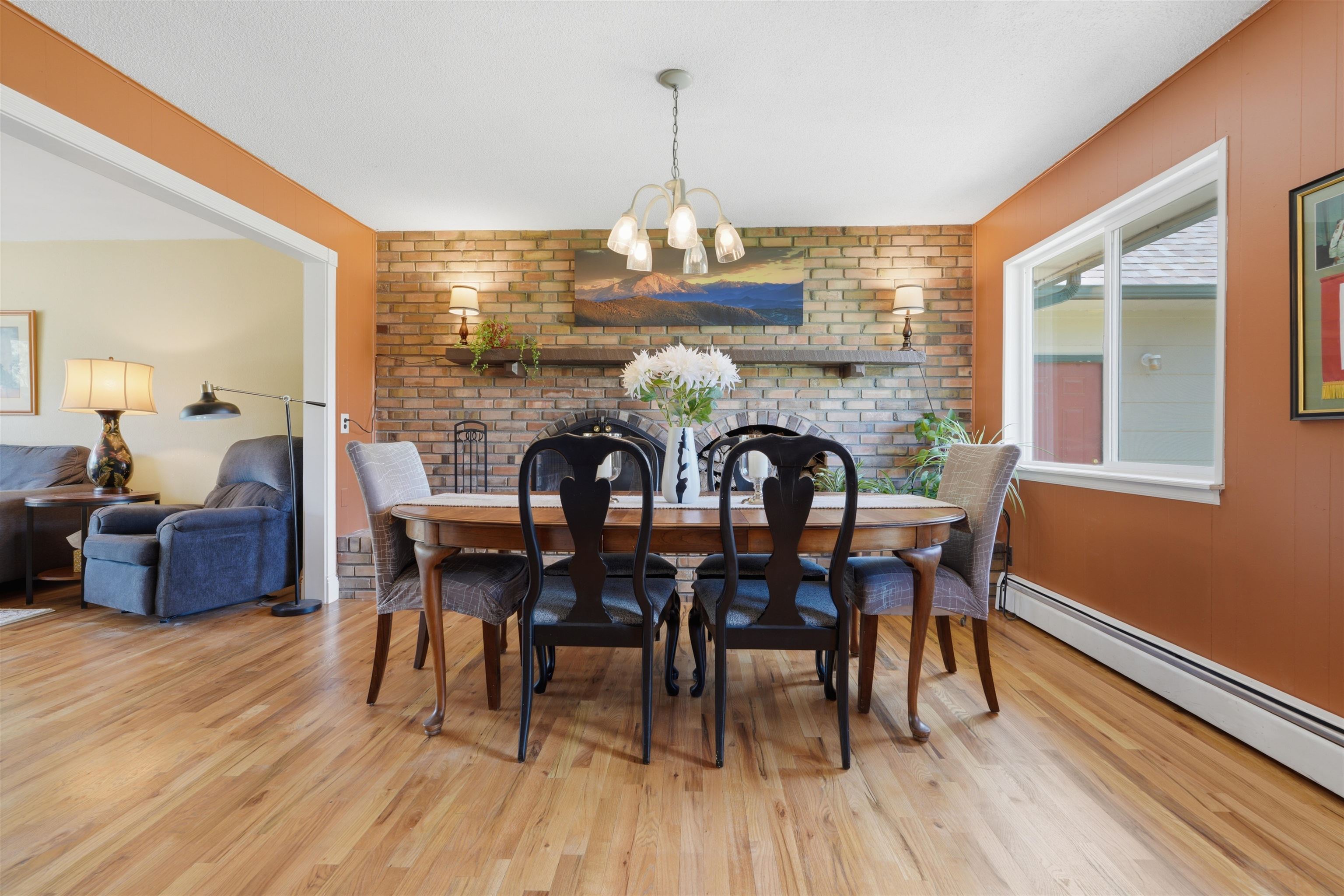 2350 E Road Grand Junction, CO 81507 - Photo 11 of 41 a view of a dining room with furniture window and wooden floor