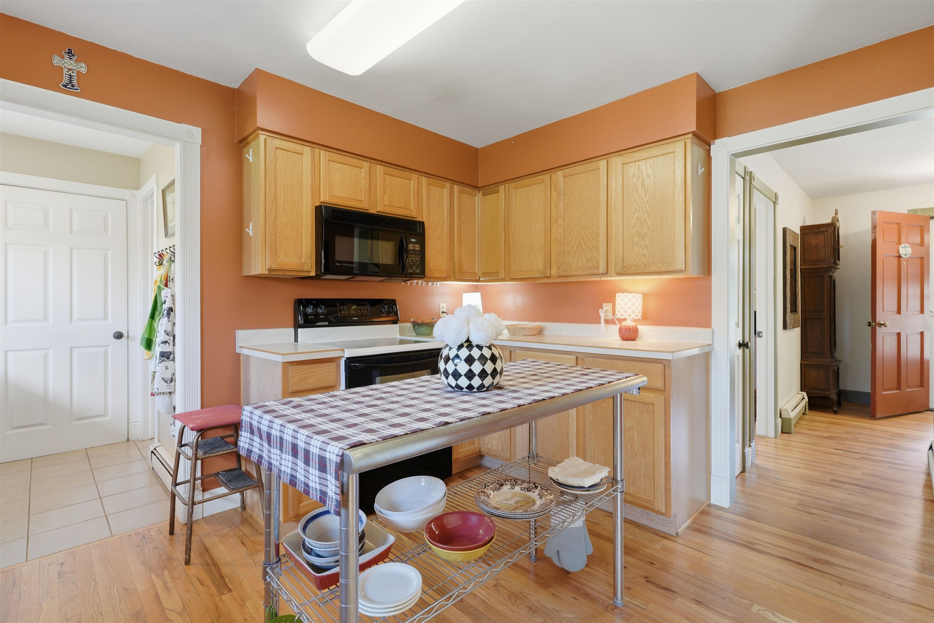2350 E Road Grand Junction, CO 81507 - Photo 13 of 41 a kitchen with granite countertop a table and chairs in it