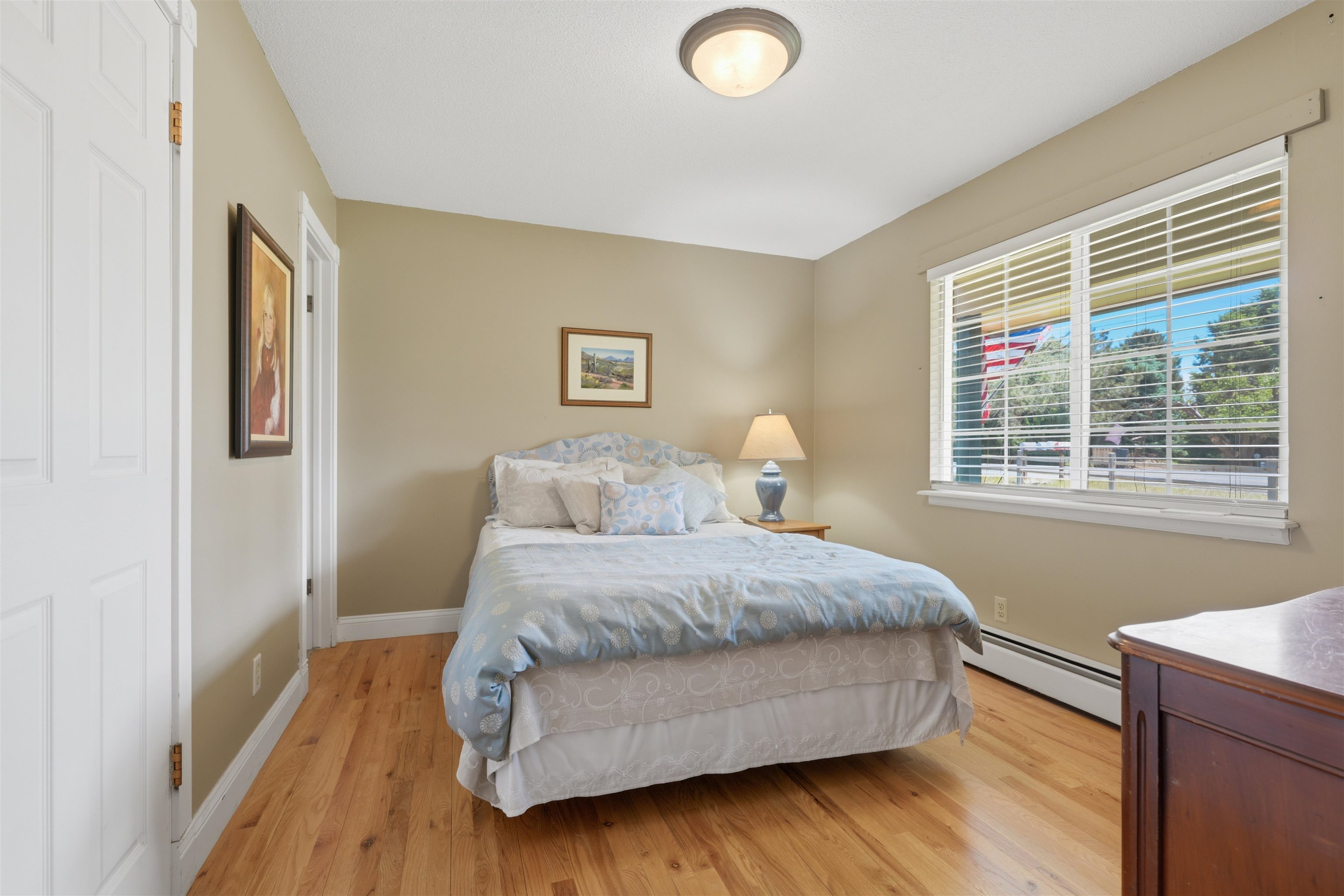 2350 E Road Grand Junction, CO 81507 - Photo 16 of 41 a bedroom with a bed and a window