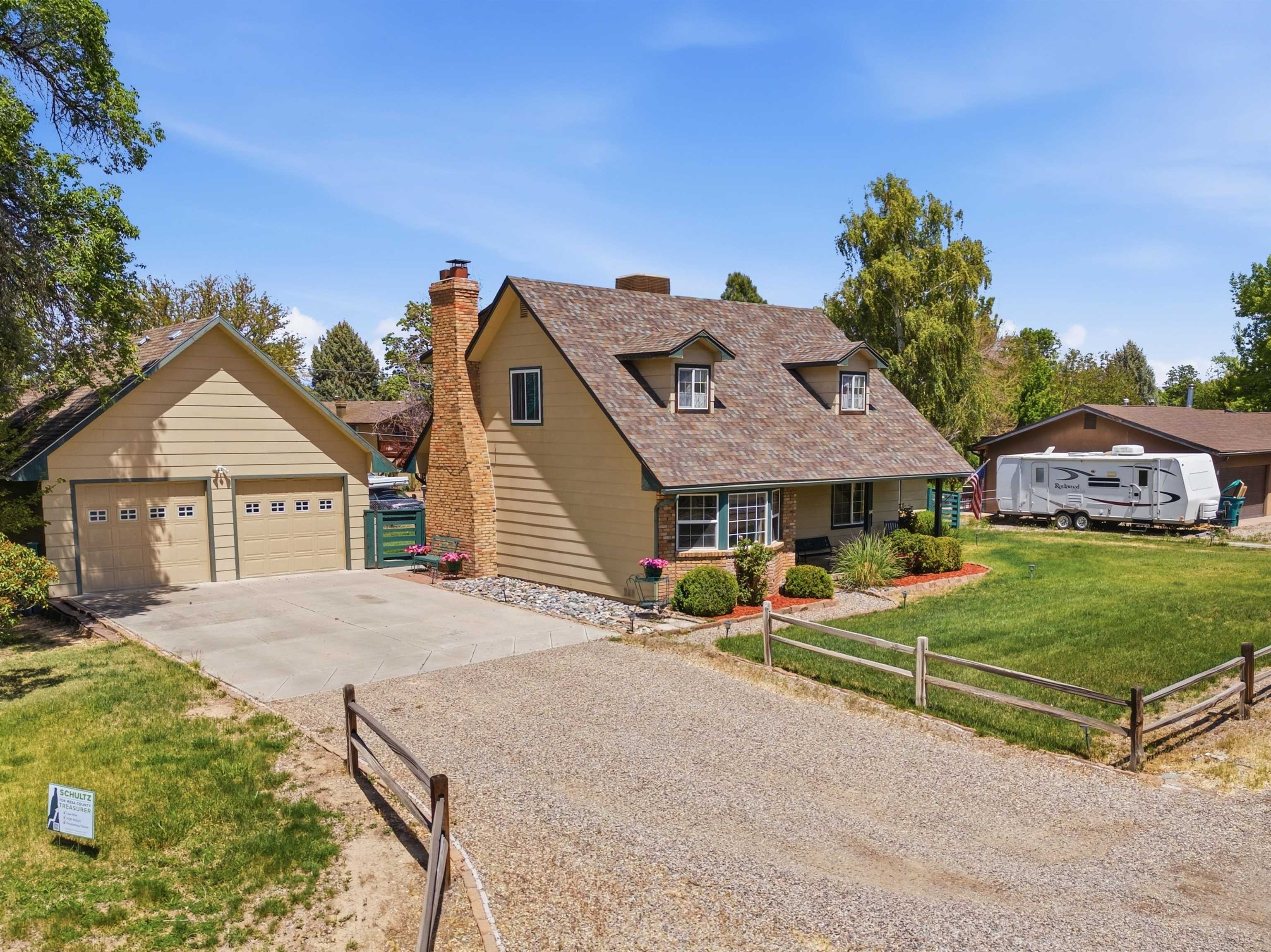 2350 E Road Grand Junction, CO 81507 - Photo 2 of 41 a view of a house with garden