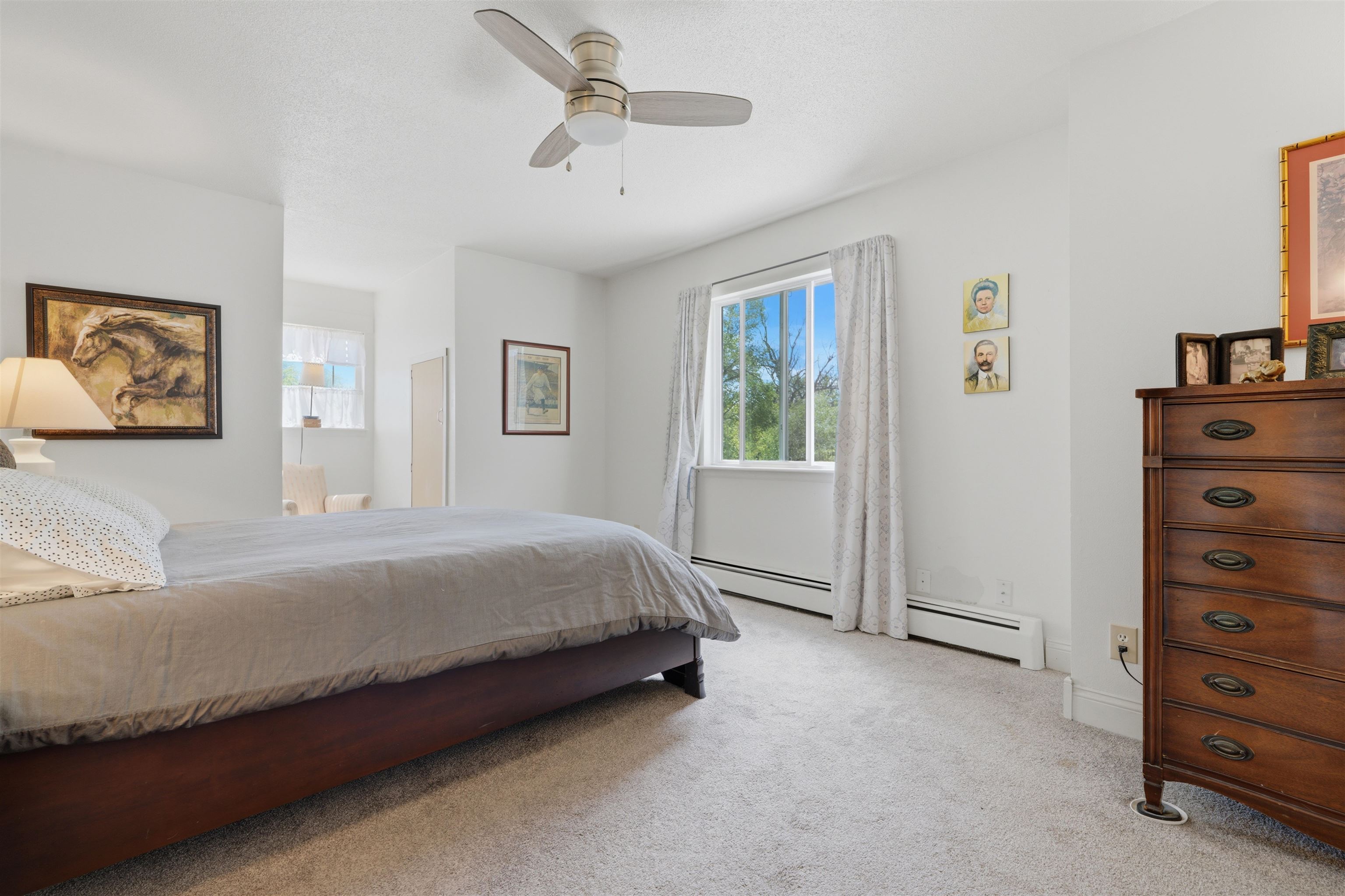 2350 E Road Grand Junction, CO 81507 - Photo 24 of 41 a spacious bedroom with a bed and a window