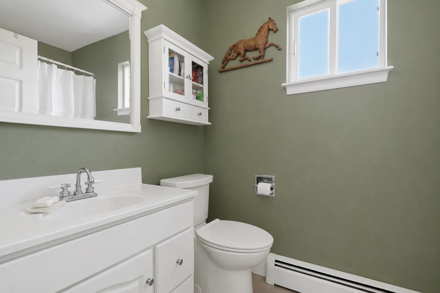 2350 E Road Grand Junction, CO 81507 - Photo 26 of 41 a bathroom with a sink toilet and mirror