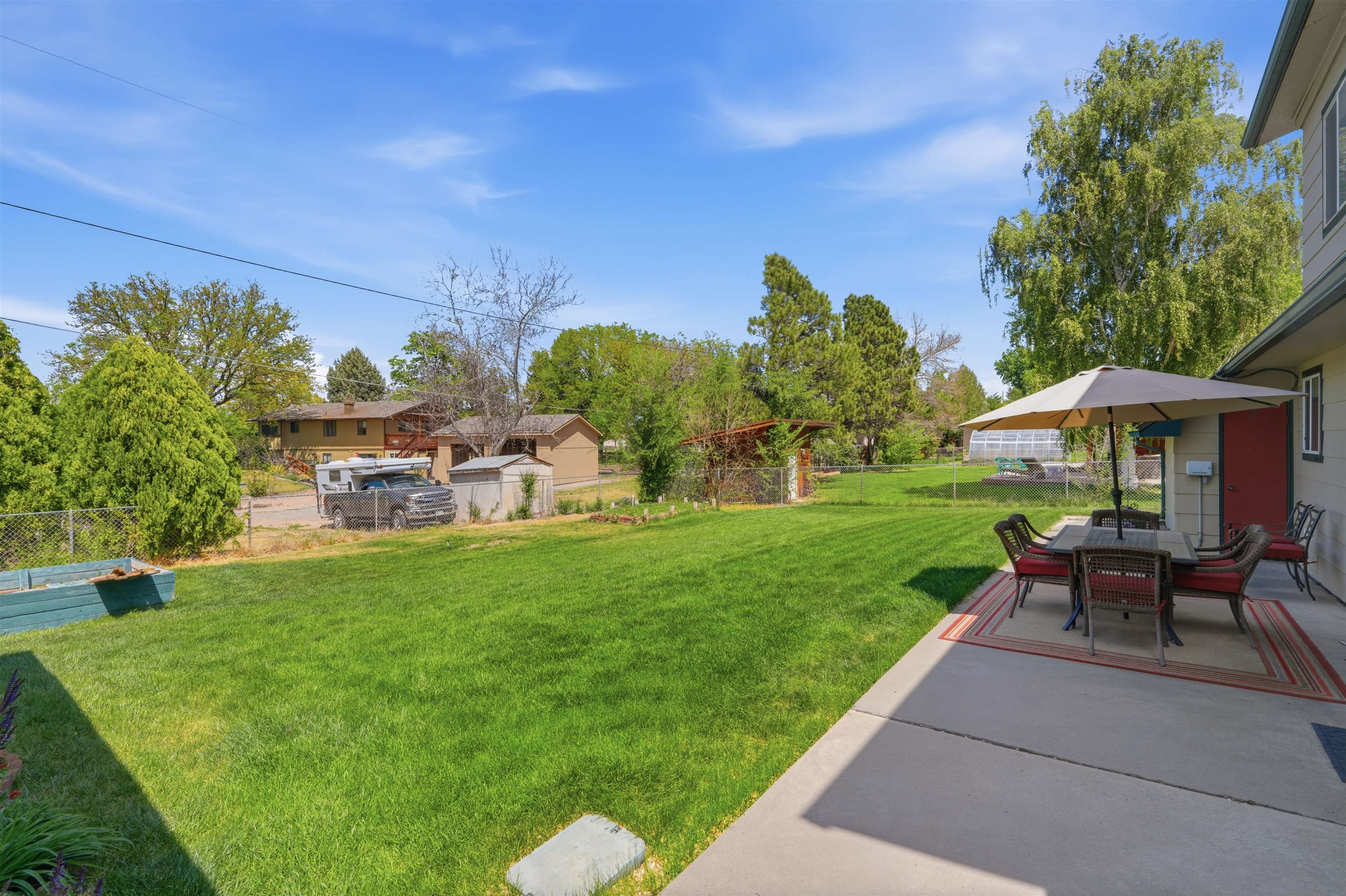2350 E Road Grand Junction, CO 81507 - Photo 35 of 41 a view of a house with a backyard