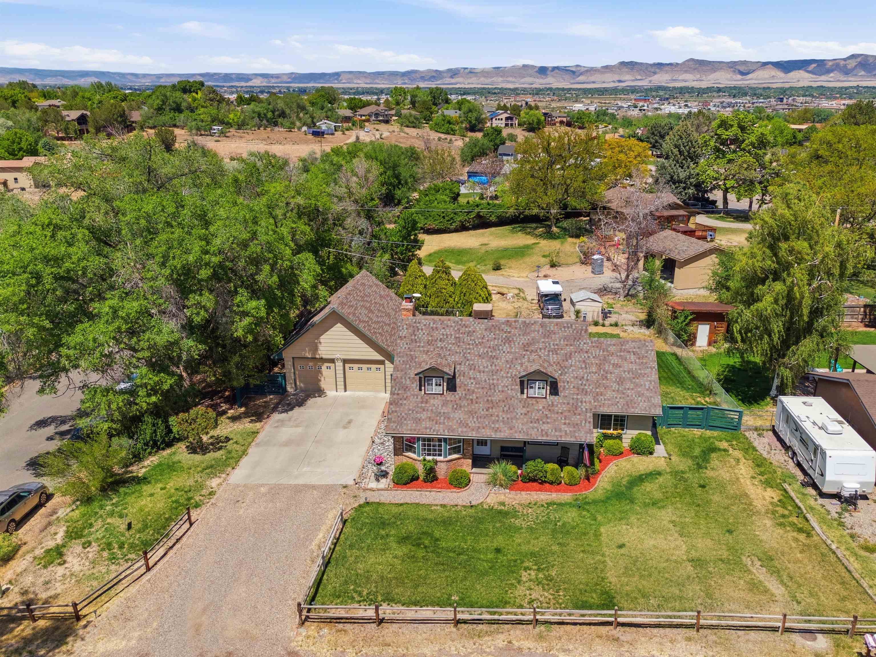 2350 E Road Grand Junction, CO 81507 - Photo 37 of 41 an aerial view of a house with a garden