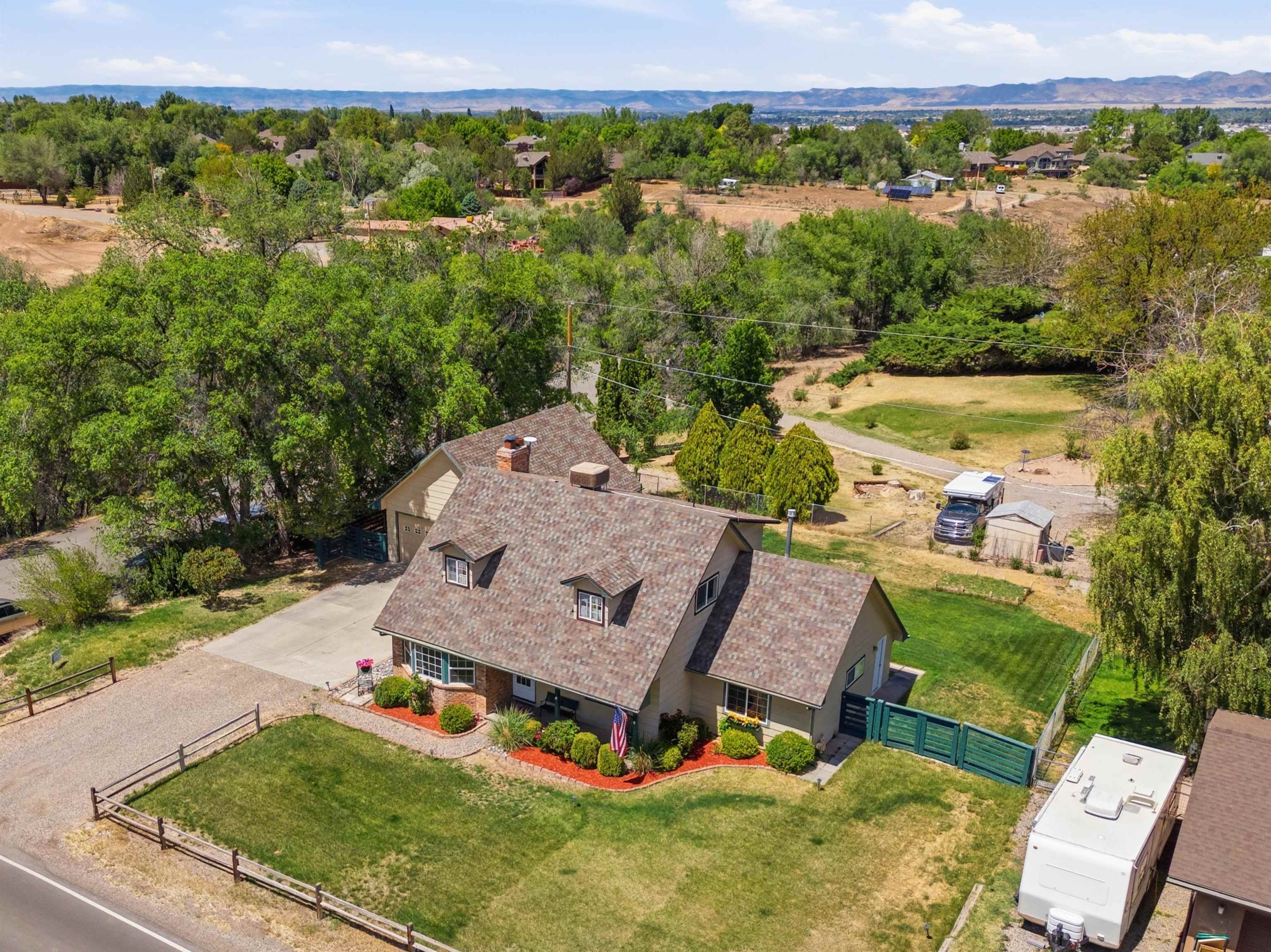 2350 E Road Grand Junction, CO 81507 - Photo 38 of 41 an aerial view of a house with a garden