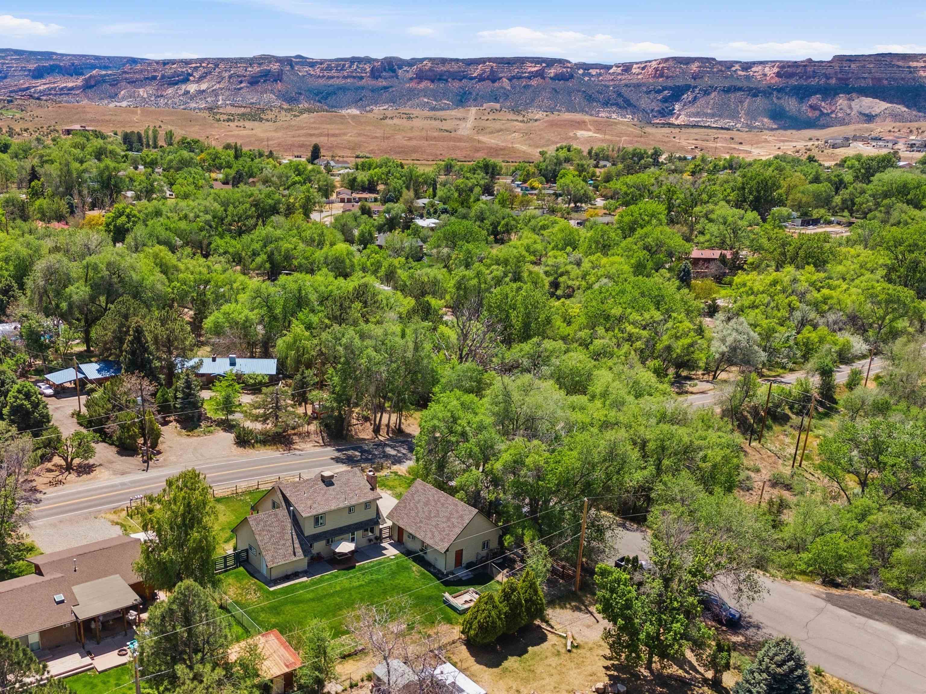 2350 E Road Grand Junction, CO 81507 - Photo 40 of 41 a view of a city with lush green forest