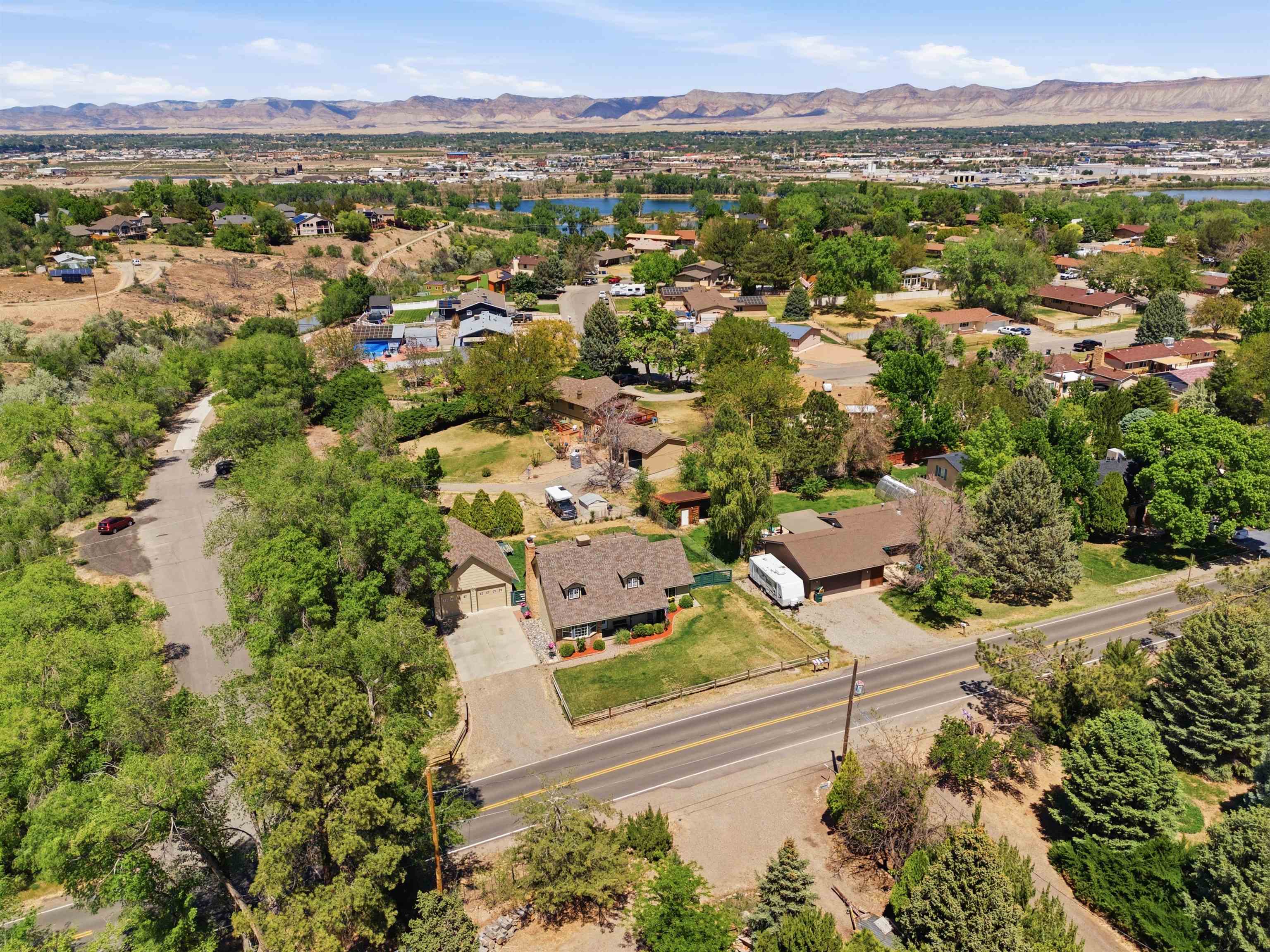 2350 E Road Grand Junction, CO 81507 - Photo 41 of 41 an aerial view of residential houses with outdoor space