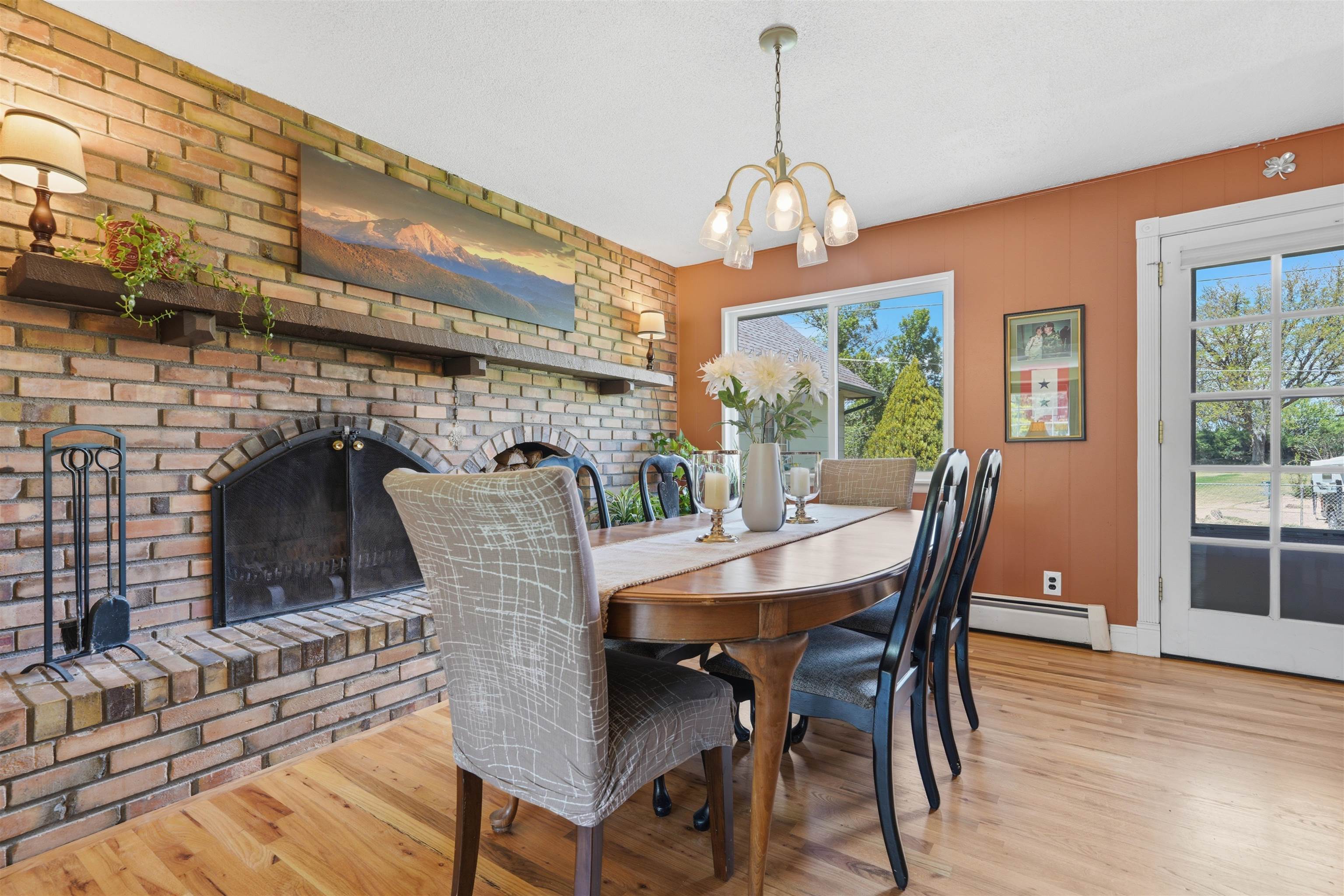 2350 E Road Grand Junction, CO 81507 - Photo 9 of 41 a view of a dining room with furniture window and wooden floor