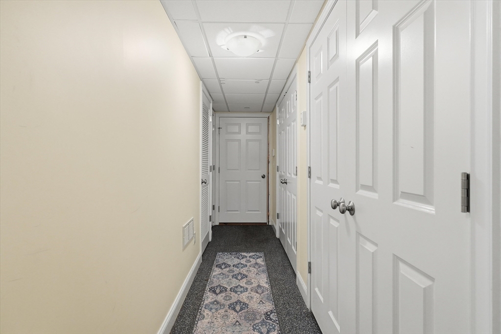 2 B Gates Lane, Unit B Wakefield, MA 01880 - Photo 25 of 42 a view of a hallway with a white walls