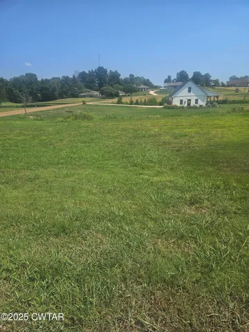 a view of a town with an ocean view