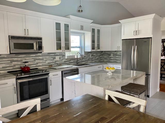 21077 Shady Vista Lane Boca Raton, FL 33428 - Photo 14 of 26 KITCHEN ISLAND & EAT-IN AREA