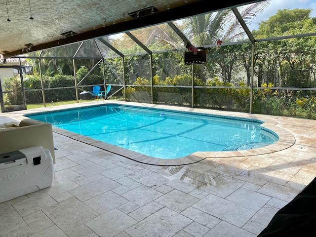 21077 Shady Vista Lane Boca Raton, FL 33428 - Photo 8 of 26 SCREENED POOL-TRAVERTINE DECK PATIO