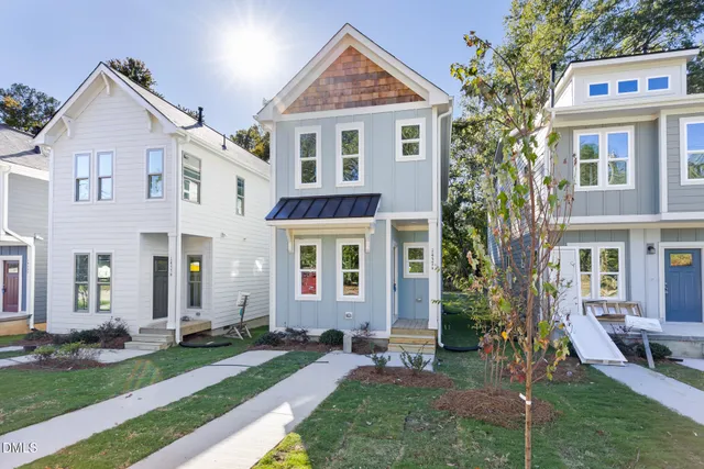 front view of a house with a yard