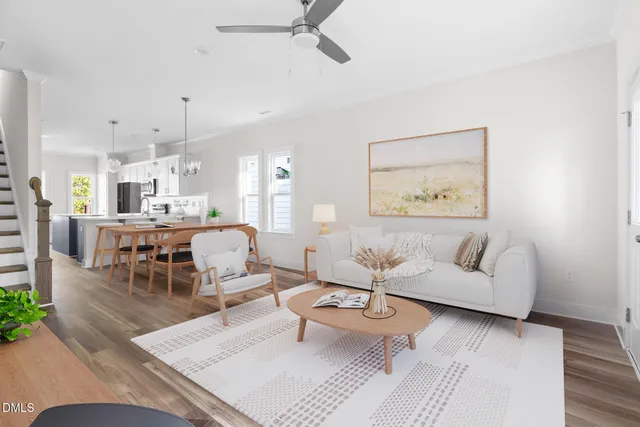 a living room with furniture and a table