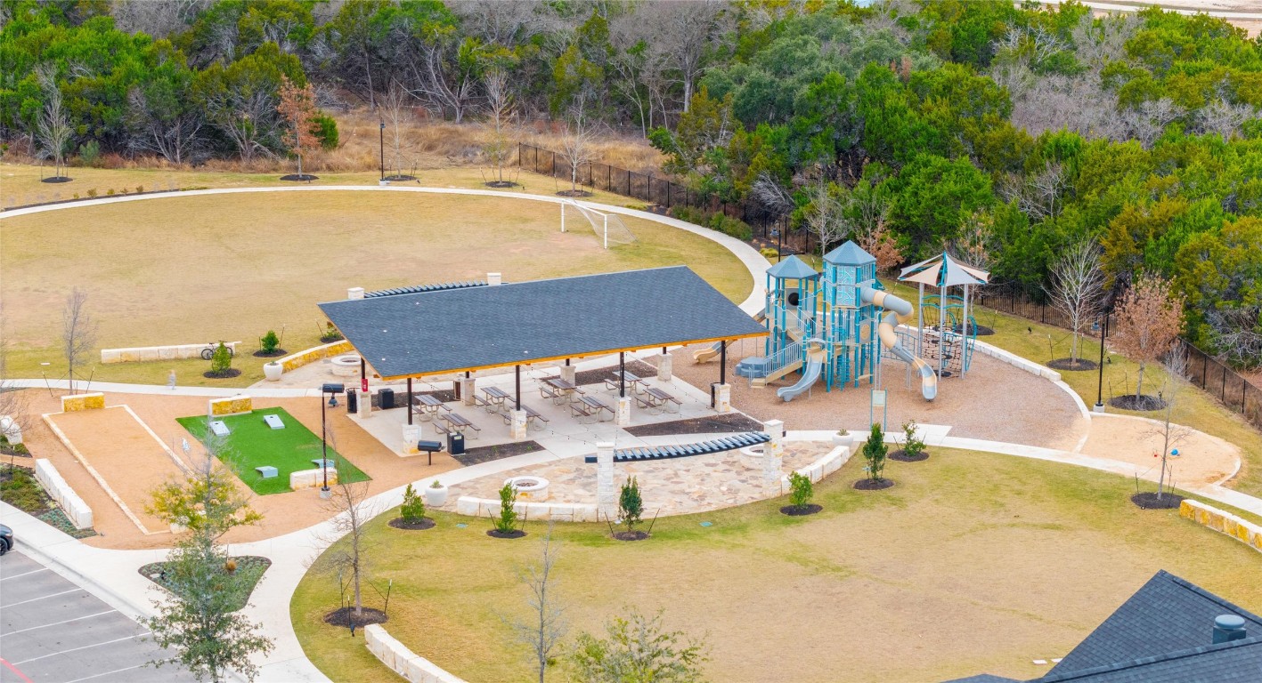 2416 Bear Cub Bend Leander, TX 78641 - Photo 23 of 24 an outdoor view with swimming pool