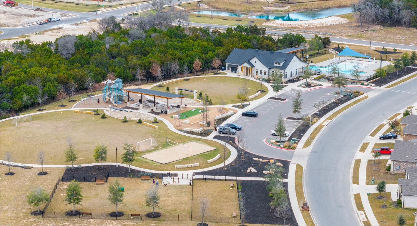 2416 Bear Cub Bend Leander, TX 78641 - Photo 24 of 24 an aerial view of a swimming pool with outdoor seating