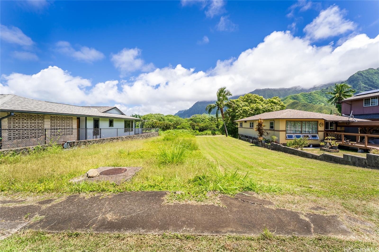 47-318 Waihee Road Kaneohe, HI 96744 - Photo 7 of 15 a front view of a house with swimming pool having outdoor seating